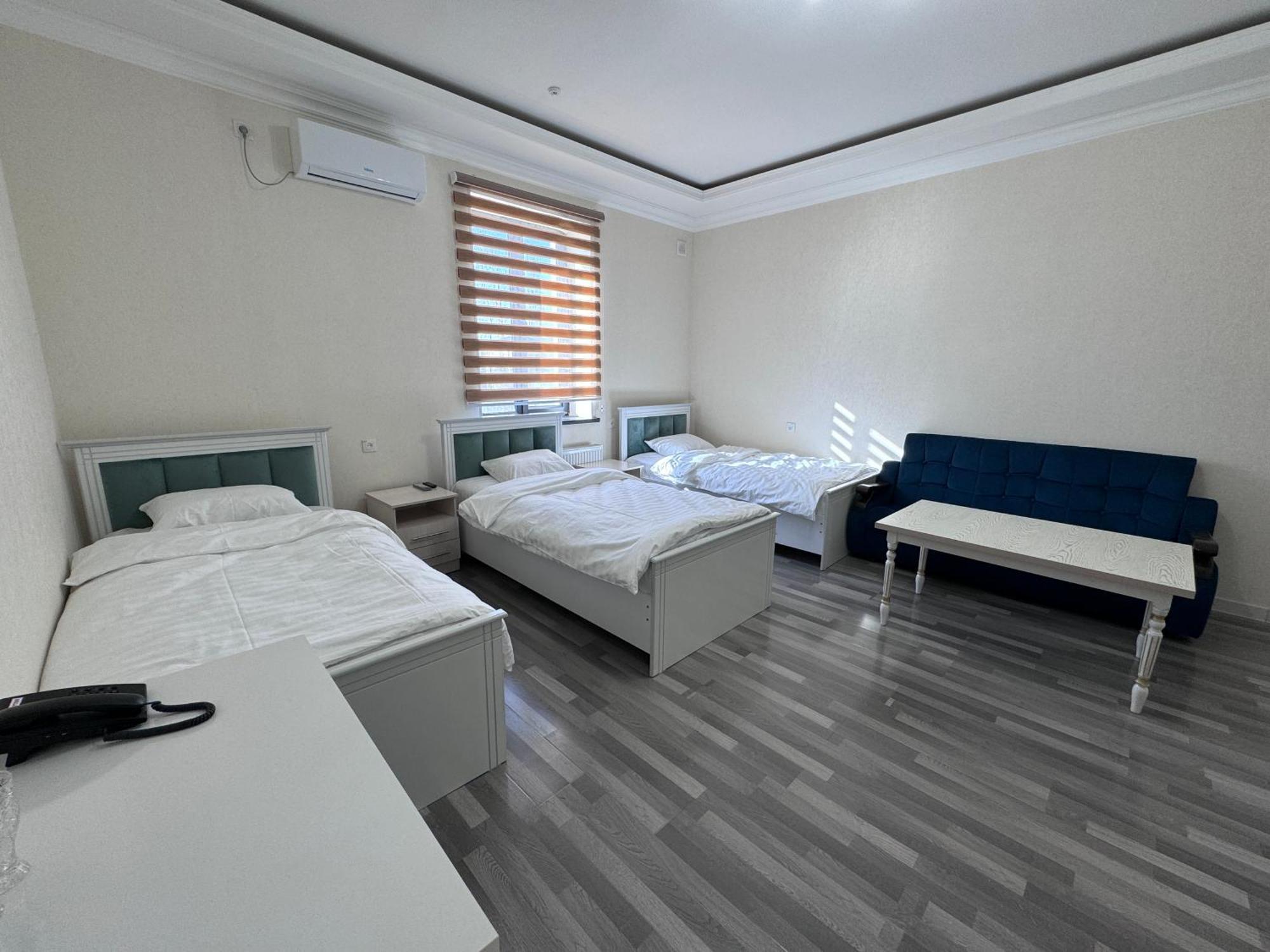 Parvoz Hotel Urgench Exterior photo